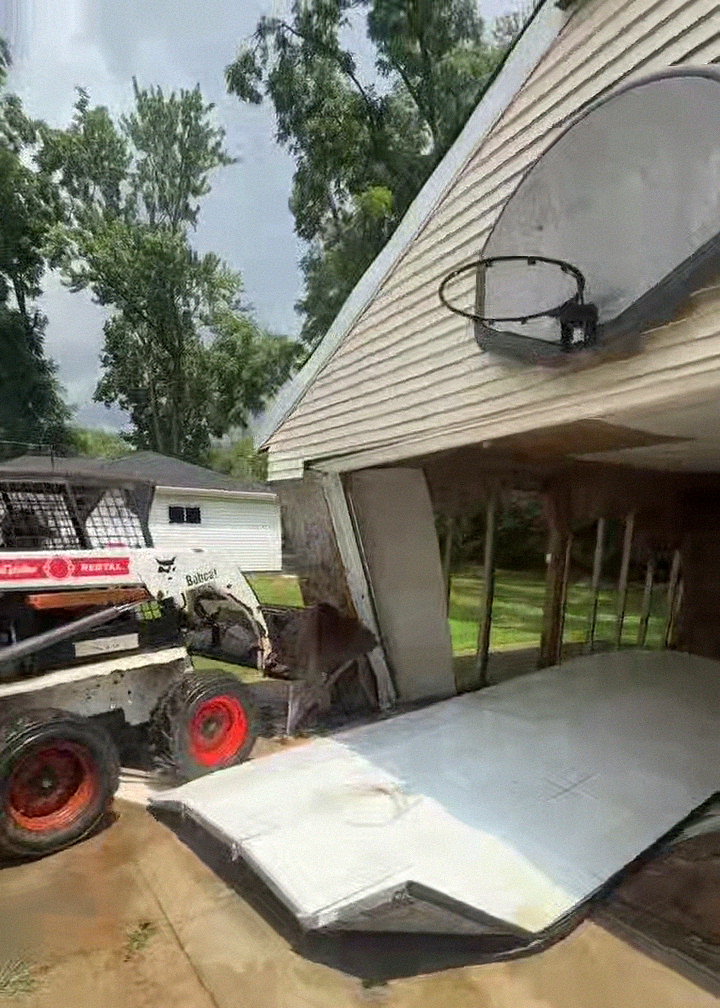 Equipment working beside a structure during a Big Dogg demolition project